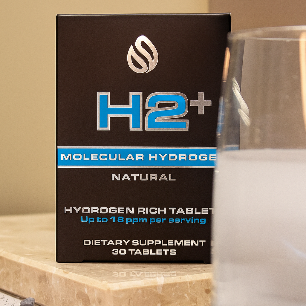 Box of H2+ Molecular Hydrogen tablets supplement with a glass of water in the background.
